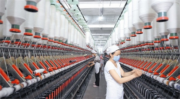 纺织原料“涨声一片” 织造企业备受煎熬